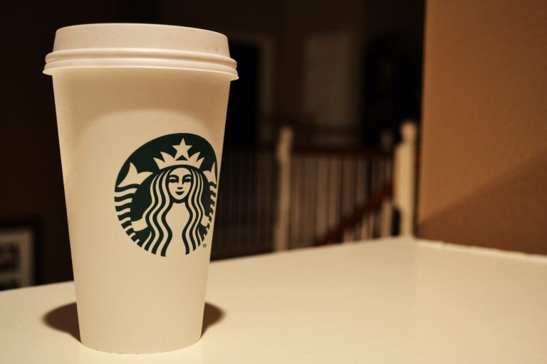 Where does SBUX stock stand as Starbucks trims menu, lays off 1,100 corporate employees?